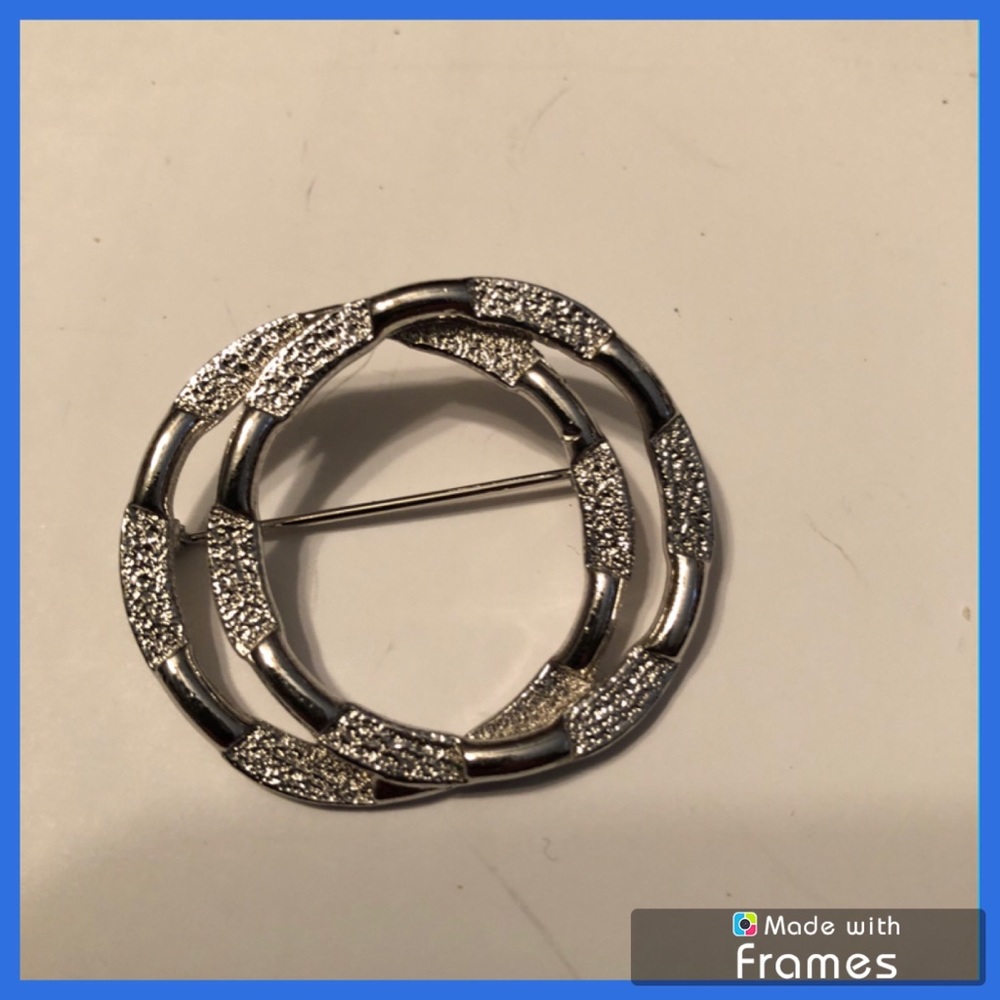 Emmons silver tone brooch